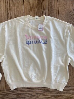 Mad Love Cream Crewneck Sweatshirt with Pink and Blue 'WICKED' Graphic